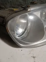 Volkswagen Touran I Lampa przednia 0301205202