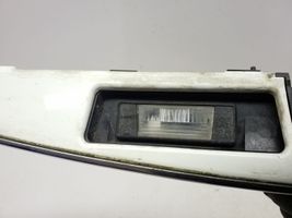 Nissan Juke I F15 Takaluukun rekisterikilven valon palkki 908681KR6A