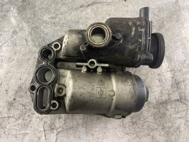 Volvo V70 Supporto di montaggio del filtro dell’olio 08642839