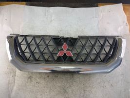 Mitsubishi Pajero Sport I Grille calandre supérieure de pare-chocs avant Mr47859798