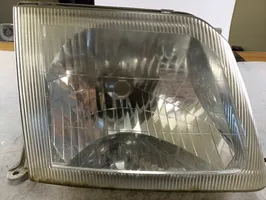 Toyota Land Cruiser (HDJ90) Lampa przednia 11077015