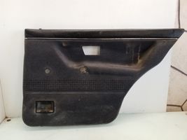 Volkswagen Golf II Rivestimento del pannello della portiera posteriore 193867212