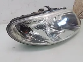 Chrysler Voyager Lampa przednia 04857701AB