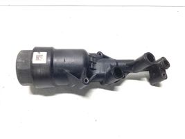 Mercedes-Benz Sprinter W906 Supporto di montaggio del filtro dell’olio 70321178