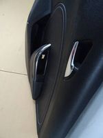 Opel Astra J Boczki / Tapicerka drzwi / Komplet 