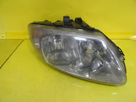 Chrysler Voyager Lampa przednia 04857702AB