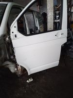 Volkswagen Transporter - Caravelle T5 Etuoven ulkokahvan valo (ulko) 