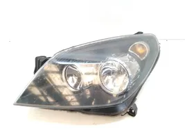 Opel Astra H Lampa przednia 1EG27037001