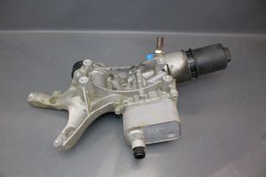 Volkswagen Jetta VI Supporto di montaggio del filtro dell’olio 06K117021B