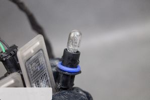 Opel Mokka Lampa oświetlenia tylnej tablicy rejestracyjnej 1350217