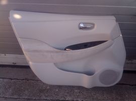 Nissan Leaf I (ZE0) Rivestimento del pannello della portiera anteriore 