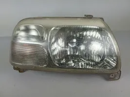 Suzuki Grand Vitara I Lampa przednia 10032078