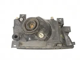 Ford Orion Lampa przednia 97AX13006GA