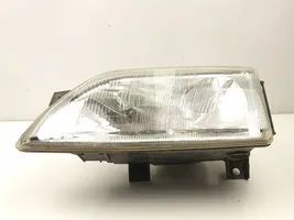 Ford Orion Lampa przednia 97AX13006GA