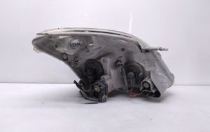 Toyota Corolla Verso E121 Lampa przednia 9922679004