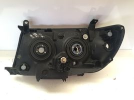 Toyota Land Cruiser (J120) Lampa przednia 8113060A90