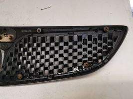 Lancia Lybra Maskownica / Grill / Atrapa górna chłodnicy 46541435