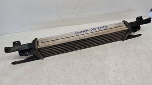 Opel Corsa D Intercooler radiator 55702004