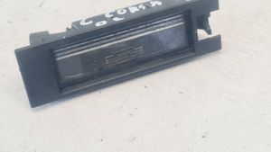 Opel Corsa C Lampa oświetlenia tylnej tablicy rejestracyjnej 09164143