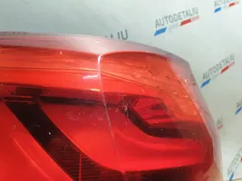 BMW 5 F10 F11 Aizmugurējais lukturis virsbūvē 7203233