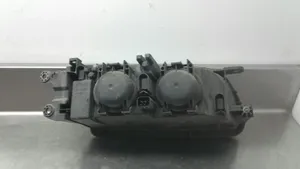 Mazda 626 Lampa przednia 1305623043