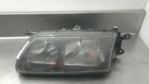 Mazda 626 Lampa przednia 1305623043