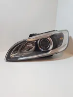 Volvo V60 Lampa przednia 31420110