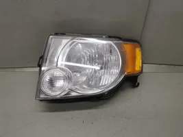 Ford Escape II Lampa przednia 9L8413006A