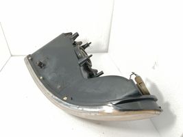 Chrysler Voyager Lampa przednia 04576313AD