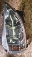 Opel Combo C Lampa przednia 13115005