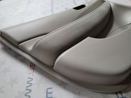 Nissan Leaf I (ZE0) Rivestimento del pannello della portiera anteriore 809233NA0A