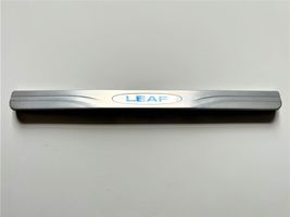Nissan Leaf I (ZE0) Front sill trim cover 999G68X001
