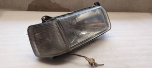 Volkswagen PASSAT B3 Lampa przednia 13348000