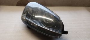 Volkswagen Golf V Lampa przednia 1K6941006AA