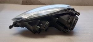 Volkswagen Golf V Lampa przednia 1K6941006AA