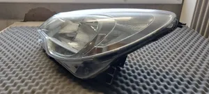 Opel Corsa D Lampa przednia 13392707