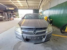 Opel Astra H Lampa przednia 1EG27037041