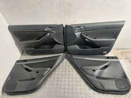 Toyota Avensis T250 Boczki / Tapicerka drzwi / Komplet 6761005460B0