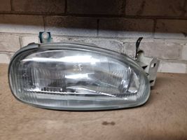 Mazda 121 Lampa przednia 0014095