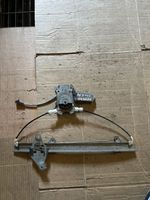 Nissan Primera Front door window regulator with motor 