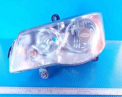 Chrysler Voyager Lampa przednia 05113345AD