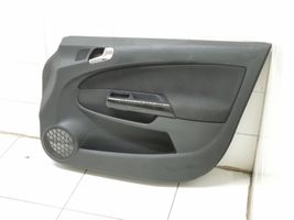 Opel Corsa D Boczki / Poszycie drzwi przednich P0112456