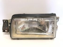 Mazda 323 Lampa przednia 11061194