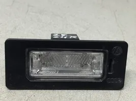 Skoda Yeti (5L) Lampa oświetlenia tylnej tablicy rejestracyjnej 8T0943021