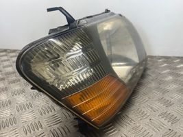 Mitsubishi Pajero Lampa przednia 10087419