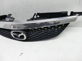 Mazda Premacy Grille calandre supérieure de pare-chocs avant C10050712