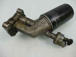 Mercedes-Benz E W124 Support de filtre à huile 1021800038