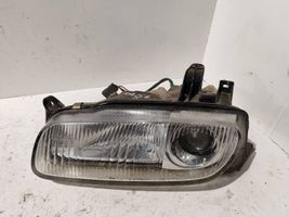 Mazda 323 F Lampa przednia 11061708