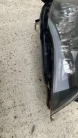 Opel Astra J Lampa przednia 13371598