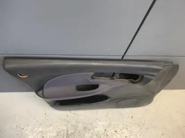 Subaru Impreza I Front door card panel trim 